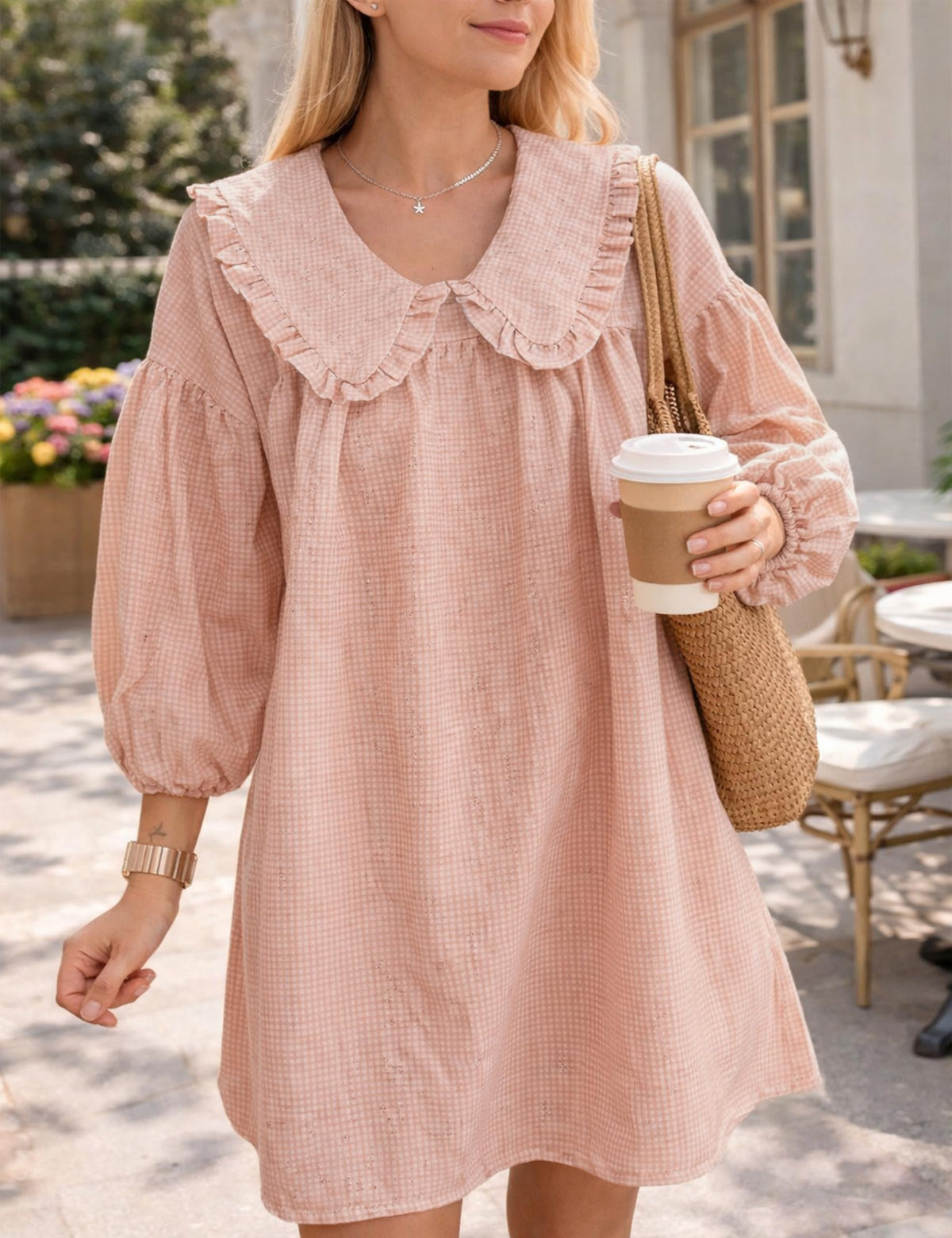 Ynhonra puff sleeve mini-dress highlighting relaxed silhouette.