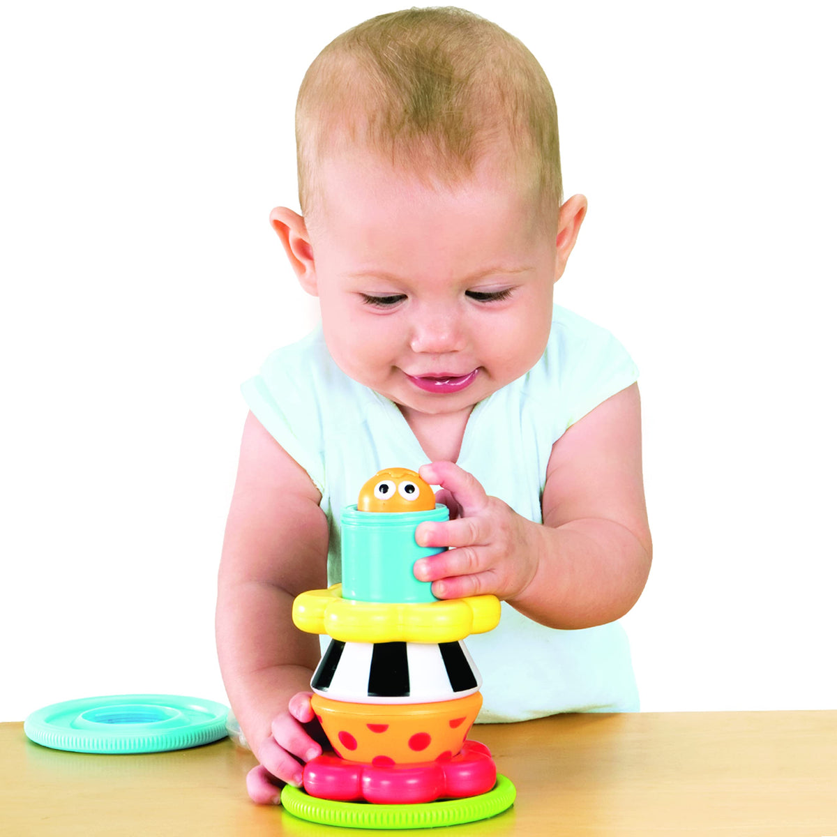Yookidoo snail shell spin action engages senses during play.