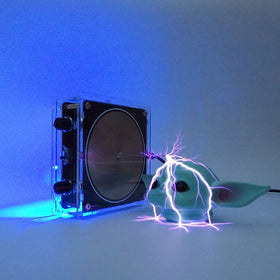 Yoqanr coil powers wireless demonstrations with music-driven sparks and wireless energy display.