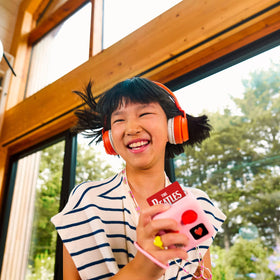 YOTO audio card inserted in player demonstrating instant playback and controls