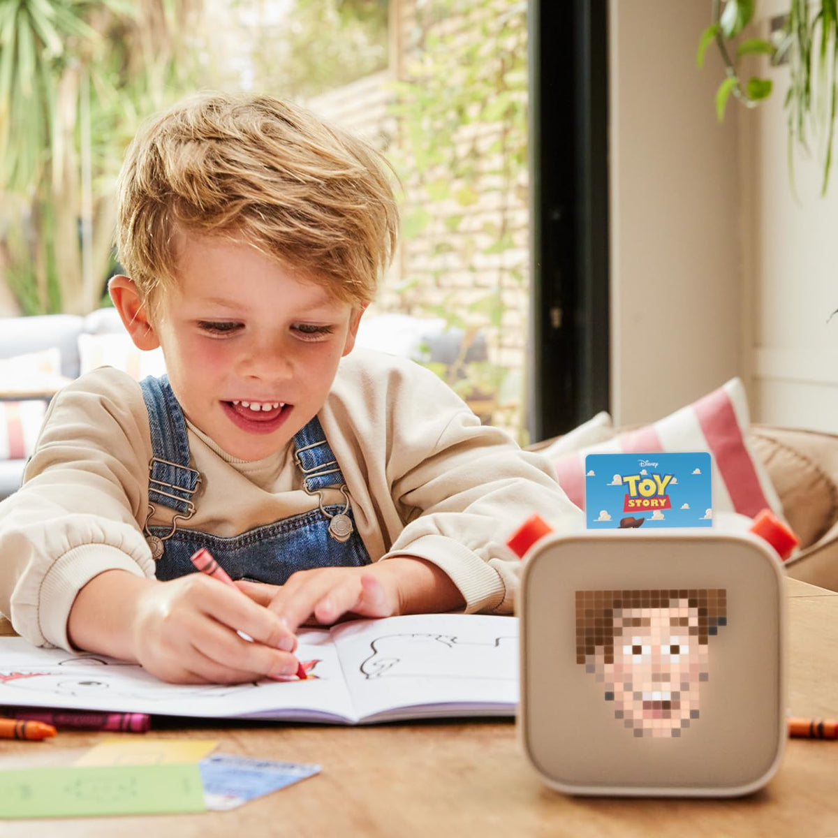 YOTO Mini in use during travel for quiet entertainment