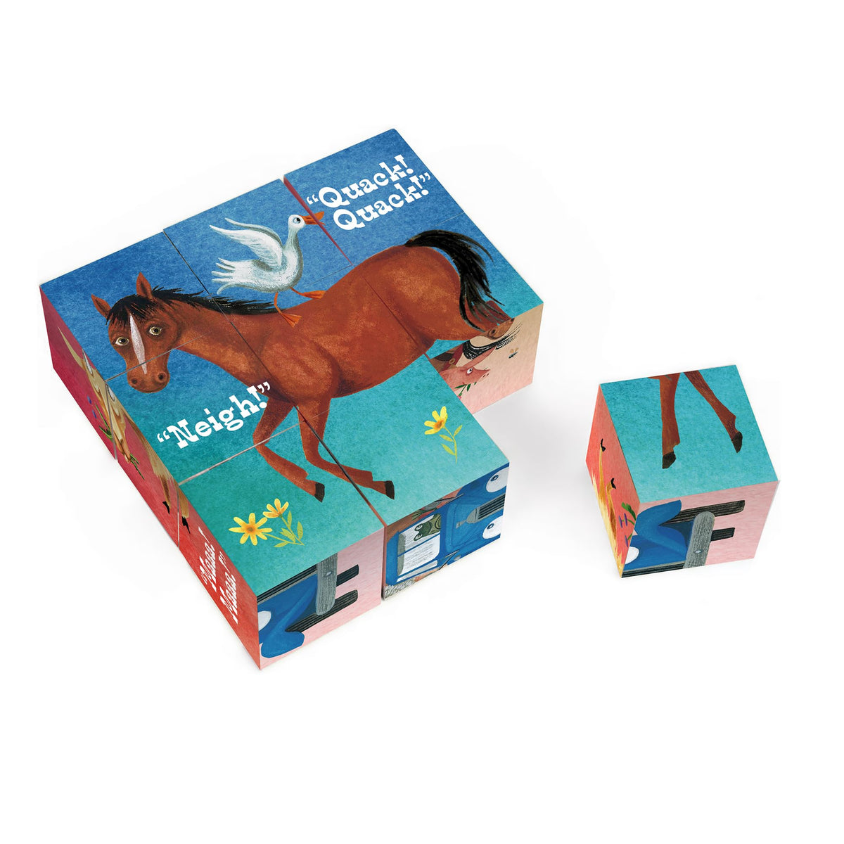 YOTTOY Little Blue Truck blocks in a child’s hands demonstrating tactile learning