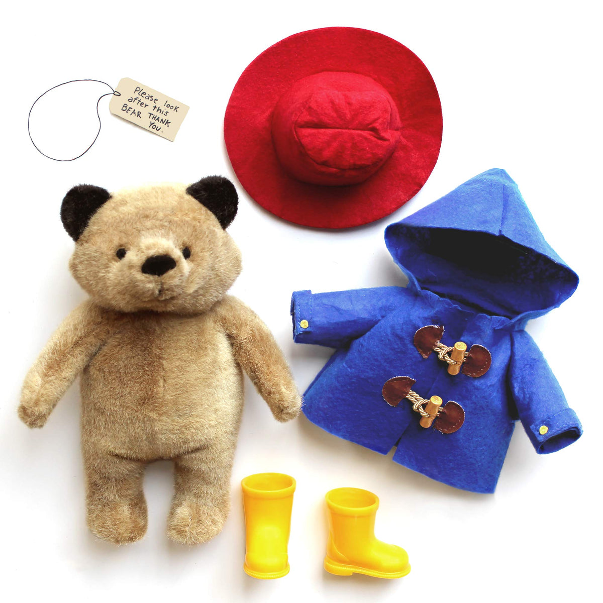 YOTTOY Paddington Bear red hat and blue coat, removable for dress-up play.