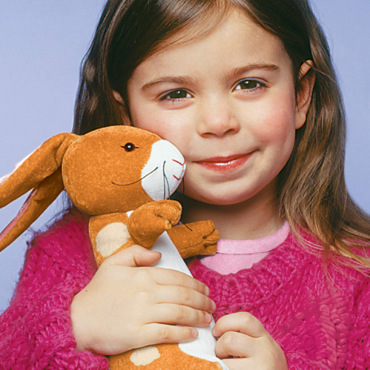 YOTTOY Velveteen Rabbit pink satin ears close-up, soft touch for little hands.