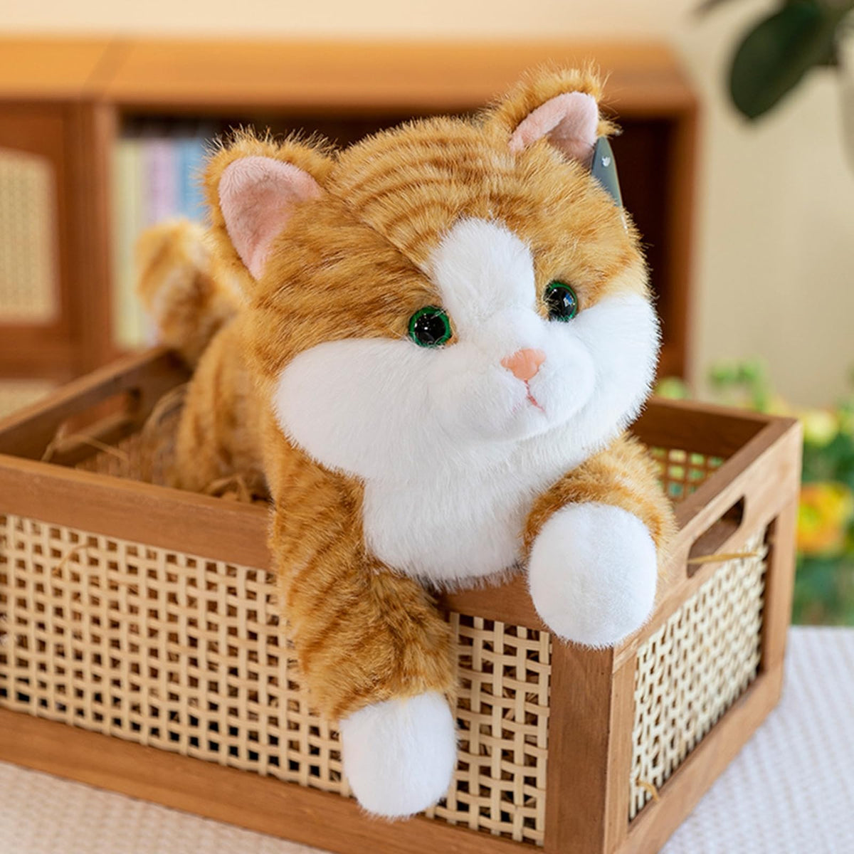 YOUBLEK cat plush on lap scene showing calm comfort.