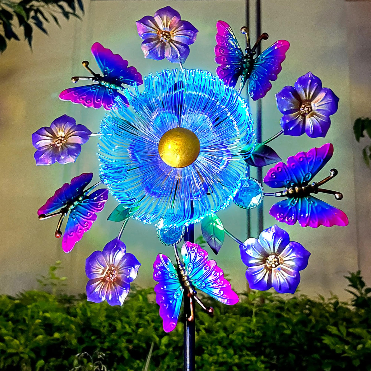 Yourongmao solar wind spinner with butterflies and flowers boosts garden decor with colorful motion.