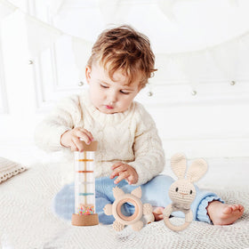 Youuys teether close up shows safe silicone and wood