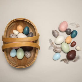 Youuys wooden eggs feature eco friendly finishes for safe play.