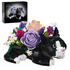YOYBLOXY tuxedo cat rose bouquet planter with lifelike pose and blooming florals.