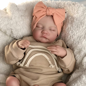 YuDill 17-Inch Realistic Baby Doll with sleeping face for imaginative nurturing play.