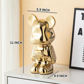 Gold-finish bear piggy bank for modern room decor and saving motivation