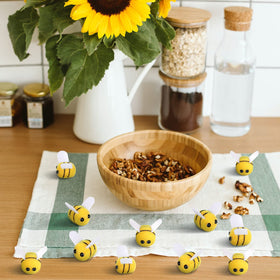 Yunsailing soft felt bees for parties add charming accents.