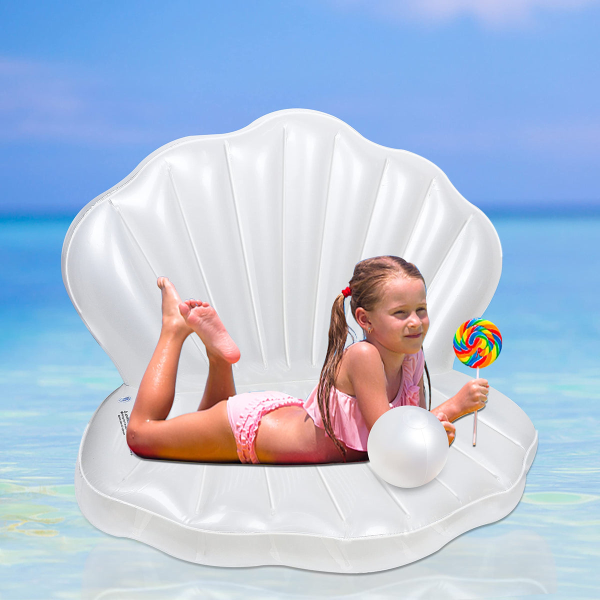 Zcaukya giant clam floats in pool with bright sunlit surface