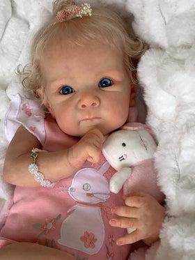 Zero Pam Reborn accessory pack with pacifier, bottle, and birth certificate