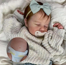 Zero Pam reborn doll face close-up shows closed eyes and serene newborn look.