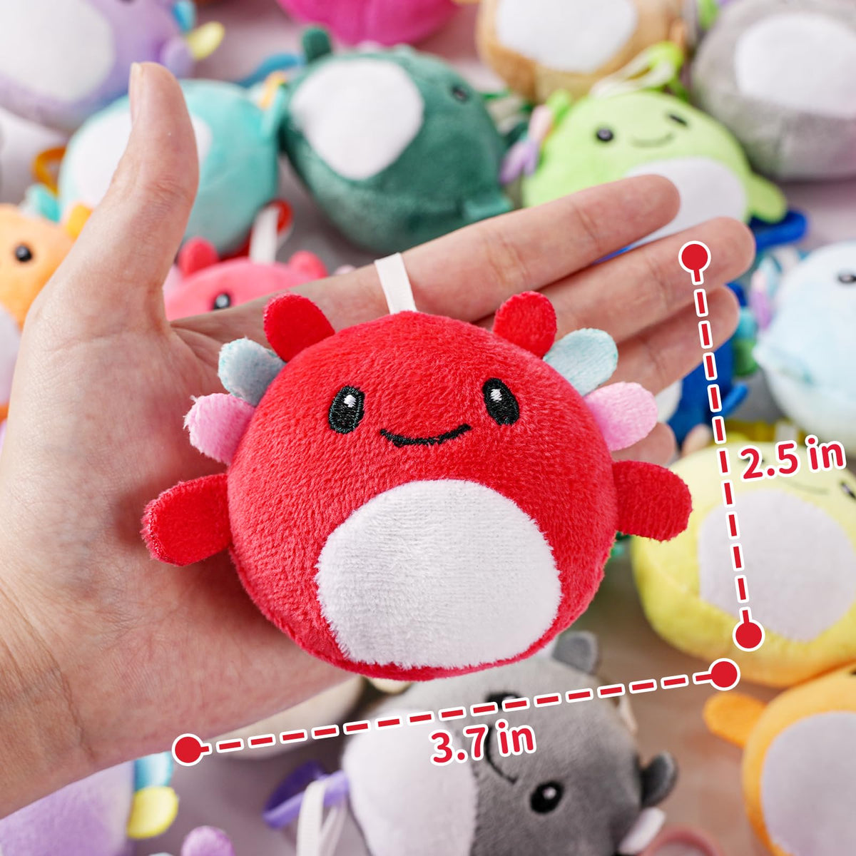 Zesua axolotl plush keychains on a backpack, adding color and charm.
