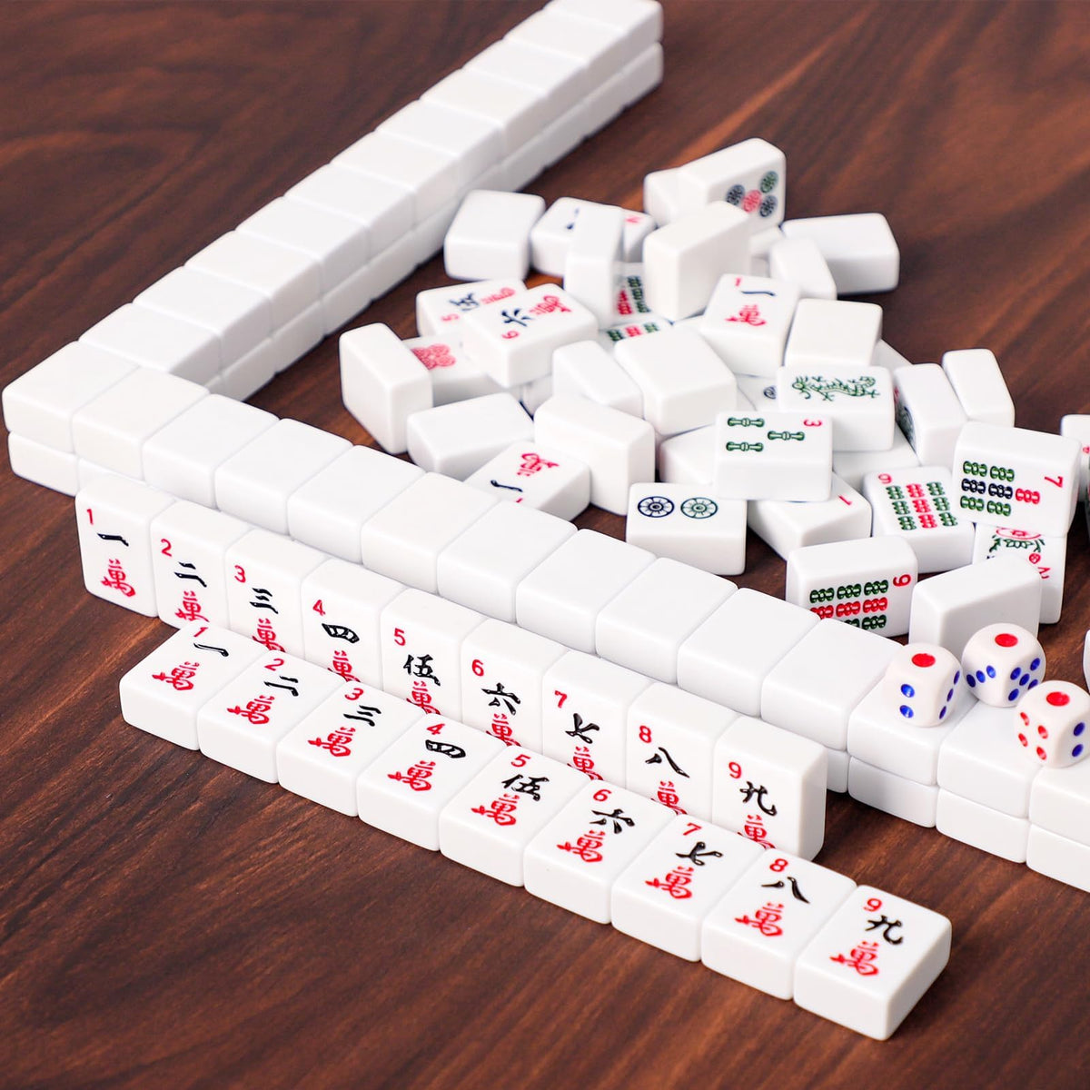 ZGME mahjong accessories including dice, money chips, and Jokers ready for play.