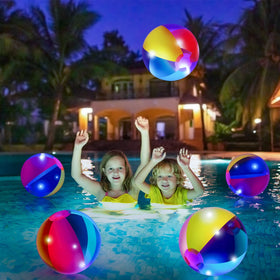 Zhanmai neon inflatable ball lights up during beach party.