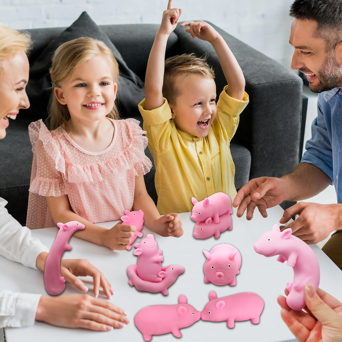 Kids playing with ZHEBAG pink pig stress toy in playroom for focus