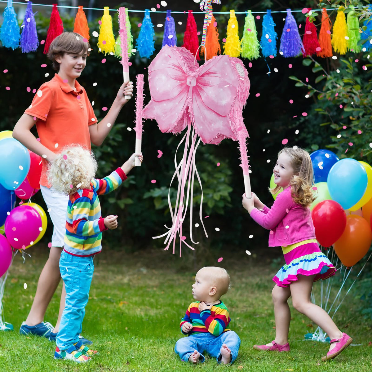 ZRUNBO Pink Bow Piñata tassels add festive motion and color.