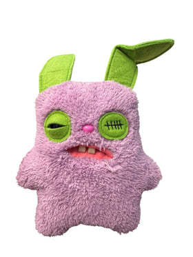 ZURU Fuggler Annoyed Alien three-eyed edition is eye-catching on a desk.