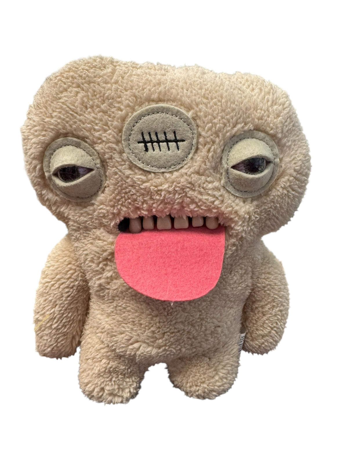 ZURU Fuggler Gaptooth McGoo plush, toothy grin for playful shelf décor.