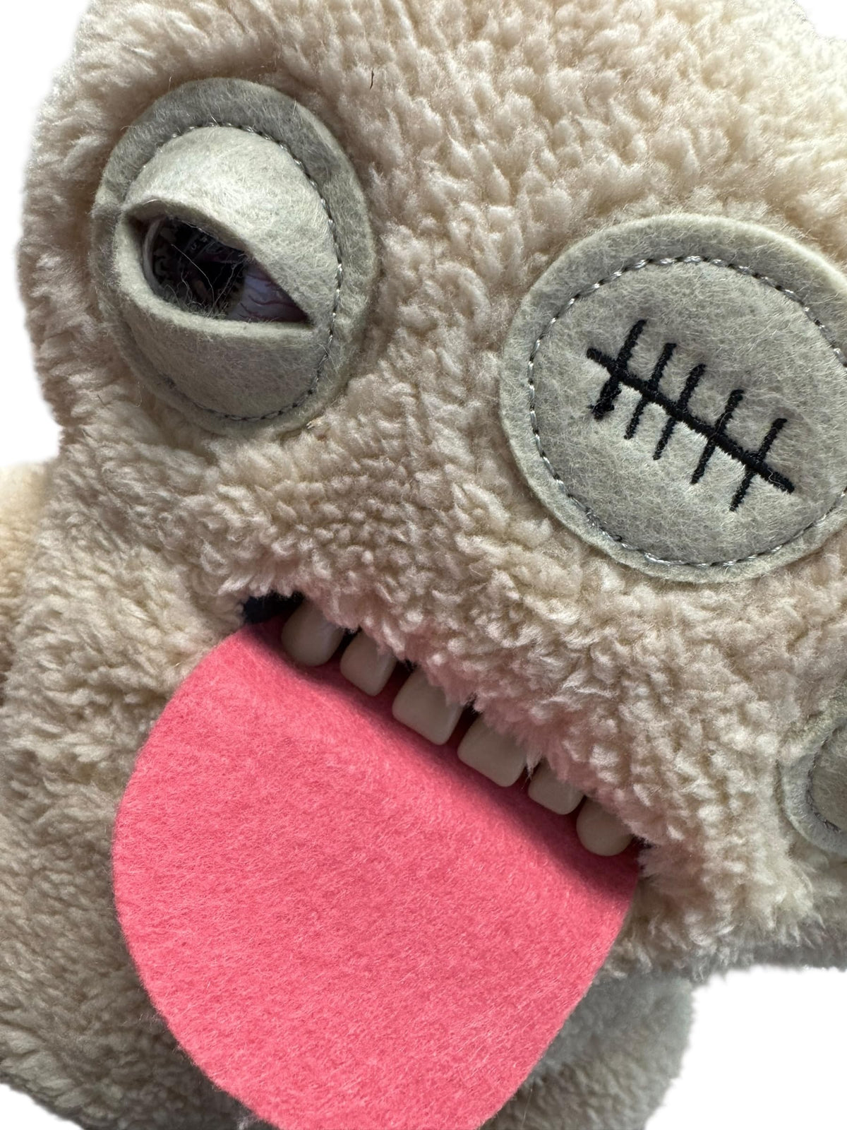 ZURU Fuggler Indecisive Monster plush green, sparks curiosity on desks or shelves.