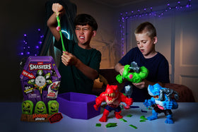 ZURU SMASHERS sand and slime reveal monster pieces for tactile play.
