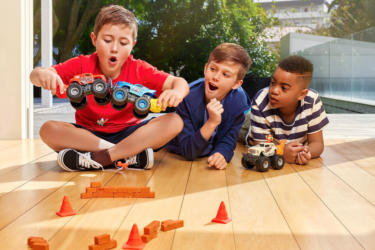 ZURU SMASHERS Monster Wheels Red Flame Mystery Pack gooey slime for tactile play.