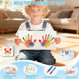 Zyllver child painting on magic paper demonstrates mess-free creativity.